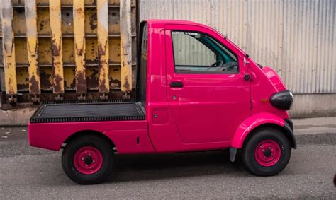 1996 Daihatsu Midget II - fuchsia | AdamsGarage - SODO-MOTO