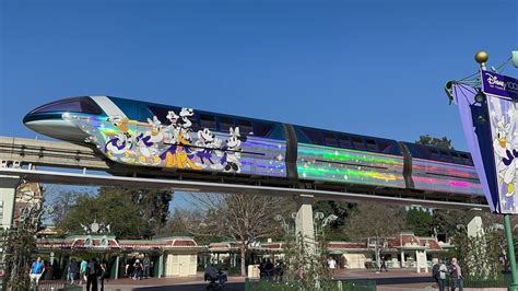 PHOTOS: Disneyland Monorail Debuts a New 100th Anniversary Wrap - WDW ...