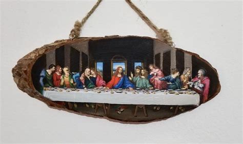 the last supper is painted on a piece of wood