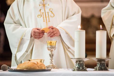 Priest Giving Eucharist Stock Photo Image Of Eucharist 173713618