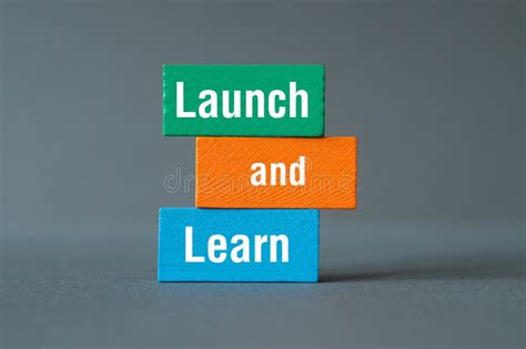 Launch And Learn Word Concept On Building Blocks Text Stock Photo