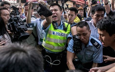 Hong Kong Police Arrest Protesters As Mong Kok Camp Is Dismantled In