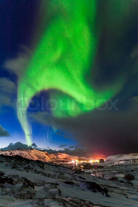 Northern lights above the fjord in Norway | Stock image | Colourbox