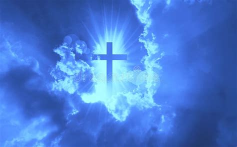 Christian Cross Appears Bright In The Dark Blue Sky Stock Image Image