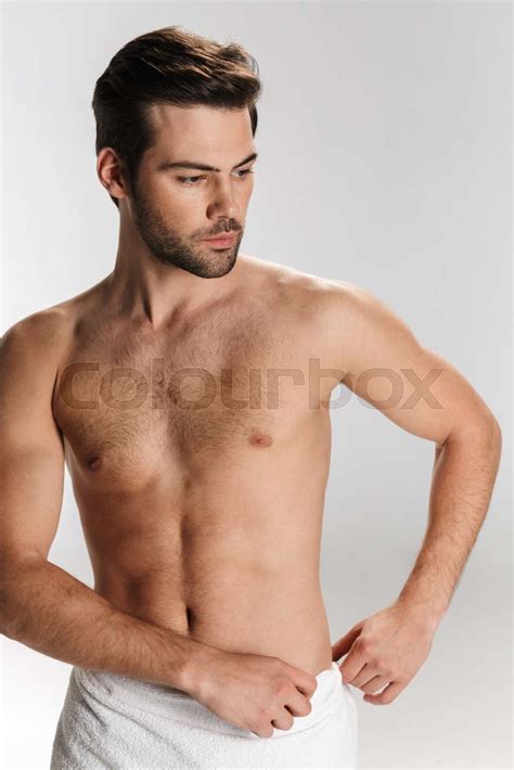 Photo Of Athletic Half Naked Man Posing And Looking Aside Stock Image