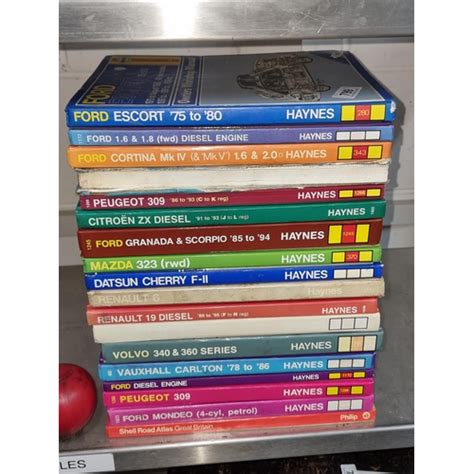 A Super Collection Of 18 Vintage Haynes Hardback Car Owners Workshop