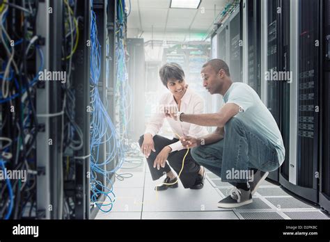 business people working  server room stock photo alamy