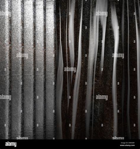 Metal on black curtain Stock Photo - Alamy