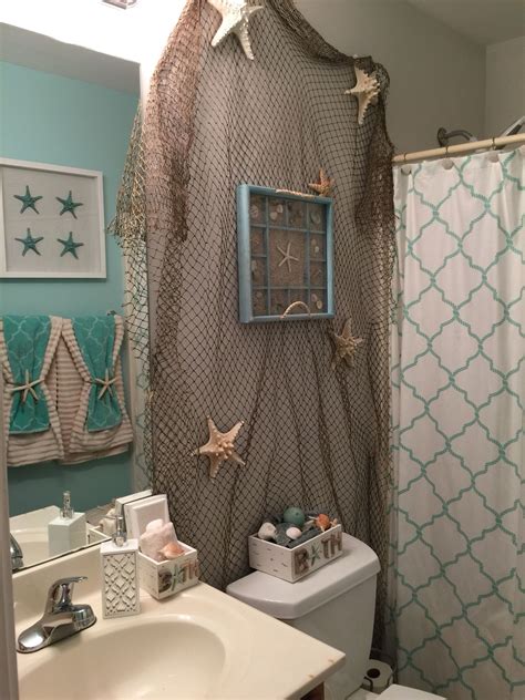 My version of nautical theme bathroom. Beach theme bathroom. in 2024 | Beach bathroom decor, Sea ...