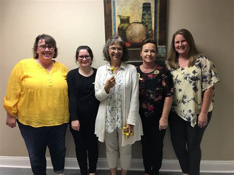 Our Mt. Vernon staff wearing yellow to raise awareness for suicide