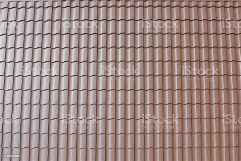 Brown Metal Tile On The Roof Of The House Corrugated Metal Roof Stock