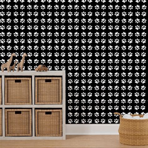 Modern Black and White Paw Print Wallpaper | Spoonflower