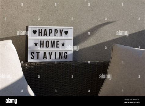 At Home On The Balcony Sign Happy Home Staying Stock Photo Alamy