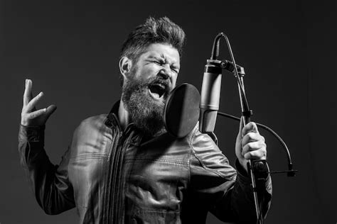 Premium Photo Singing Man In A Recording Studio Expressive Bearded