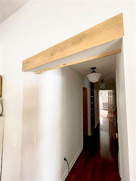 How to Make a Faux Wood Beam Door Header | Faux wood beams, Wood beams