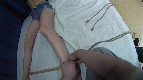 Onscreen Bondage Tying And Gagging Barefoot Sally In A Balltie With Her Wrists Tied To Her