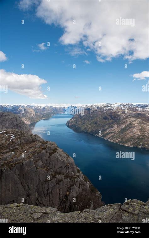 Huge steep cliff Preikestolen in the Norway Stock Photo - Alamy