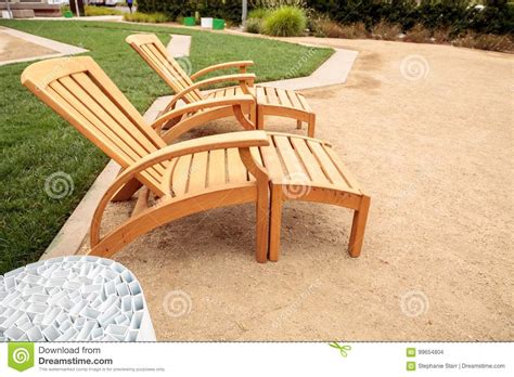 Wood Patio Lounge Chairs in the Backyard Stock Photo - Image of ...