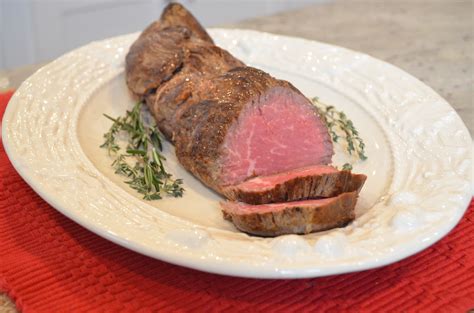 Beef Tenderloin For Christmas Spoon It Over Sliced Tenderloin On A Platter For A Stunning