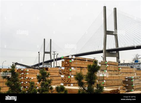 Delta Cedar sawmill and the Alex Fraser Bridge to Annacis Island with ...