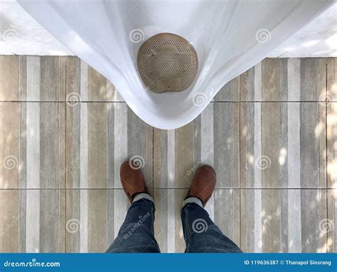 Man Standing In Front Of Urinal Top View Stock Image Image Of