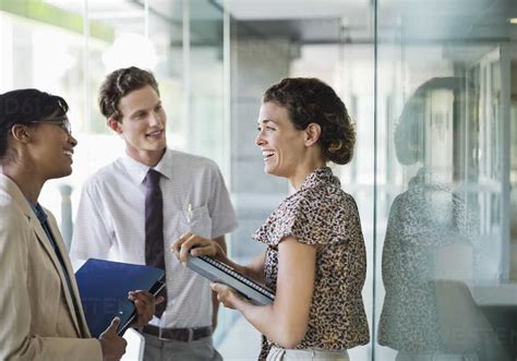 Business people talking in office stock photo