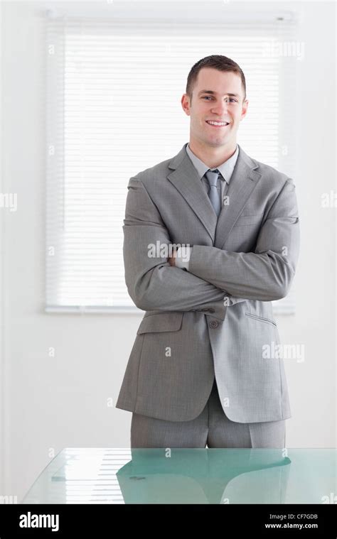 Business Man With His Arms Folded And Smiling Stock Photo Alamy