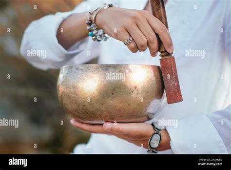 Sound Therapy With Tibetan Singing Bowl Stock Photo Alamy