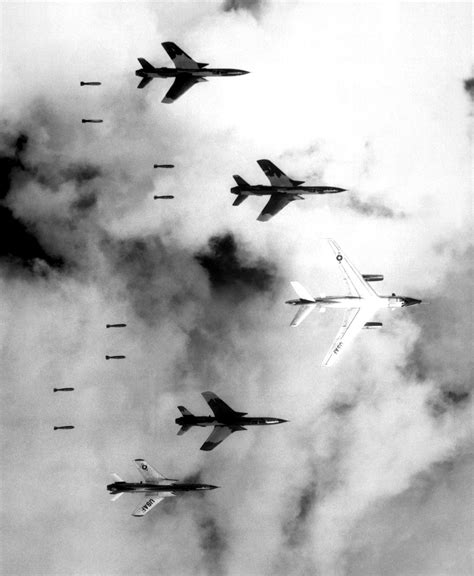 B-66 Destroyer and four F-105 Thunderchiefs dropping bombs in the ...