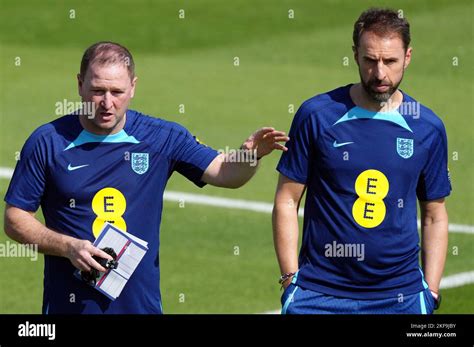 England Manager Gareth Southgate With Assistant Coach Steve Holland During A Training Session At