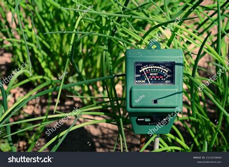 measure soil ph level moisture content stock photo