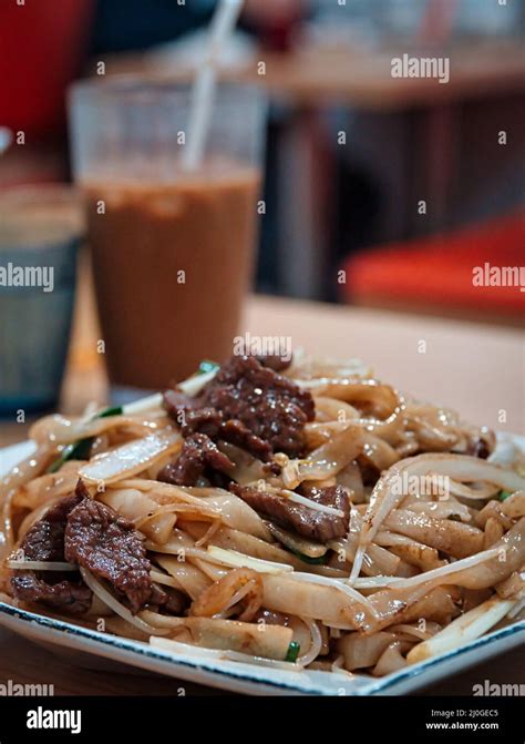 Closeup Of Stir Fried Rice Noodles With Beef In A Cantonese Restaurant In Macau China Stock