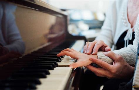 Fingers On Piano Keyboard