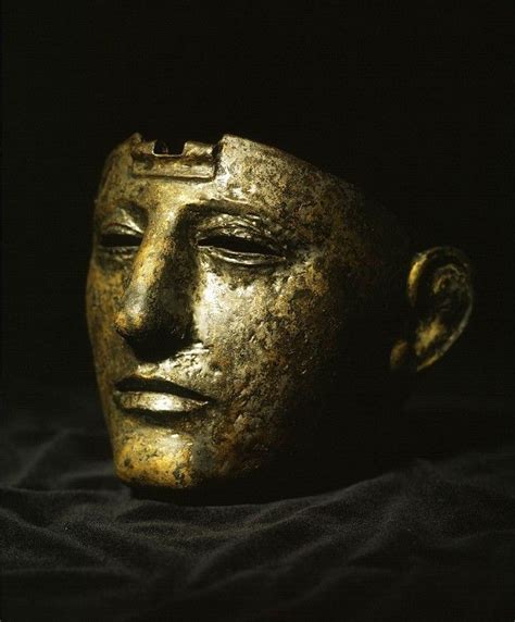 Roman bronze mask coated with silver. The mask has a hinge at the top, it was meant to cover the ...