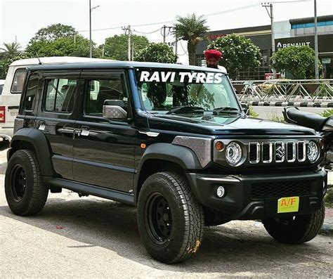 Maruti Suzuki Jimny Modified With Off Road Alloy Wheels And All Terrain