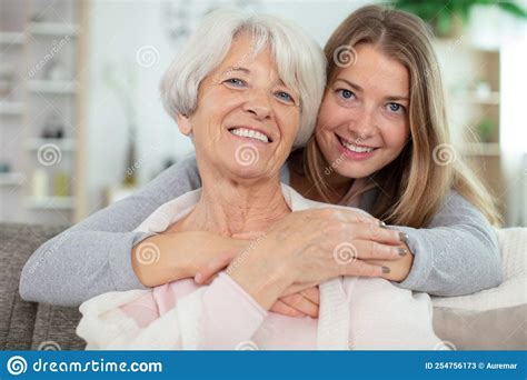 Cheerful Woman Embracing Senior Mother Stock Image Image Of