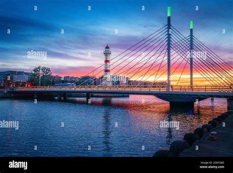 Malmo Old Lighthouse and University Bridge at sunset - Malmo, Sweden ...