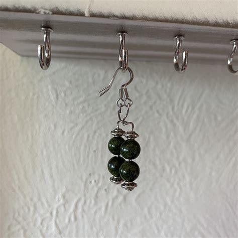 dainty dark green earrings