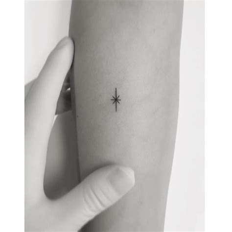 Minimalistic North Star Tattoo Located On The Inner