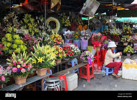 flower seller in the central market phnom penh cambodia Stock Photo - Alamy