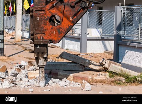 Machine Pneumatic Hammer Drill Breaking Asphalt Concreat At Road On Hot