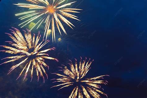 Colorful Fireworks And Salutes Light Up The Night Sky Photo Background And Picture For Free