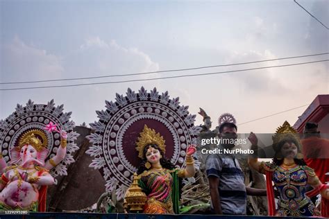 Hindu Devotees Submerge A Clay Idol Of The Hindu Goddess Durga On The