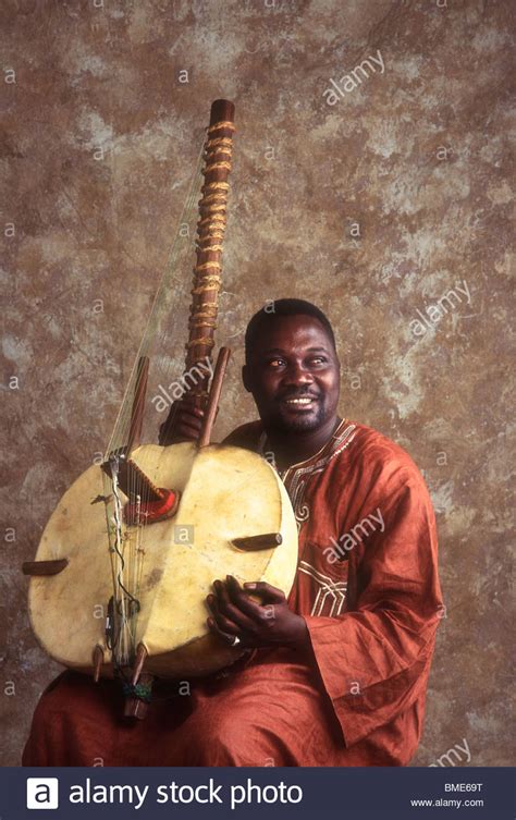 traditional African folk guitar player Stock Photo - Alamy