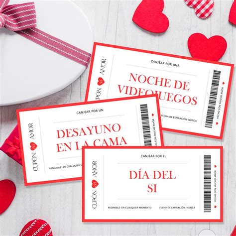 Three Red Tickets Sitting On Top Of A White Table Next To Hearts And Paper Cutouts