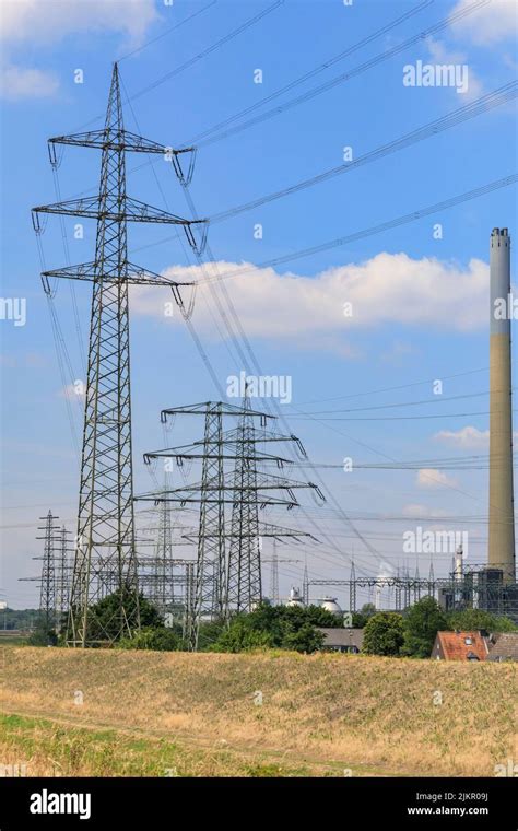 Electricity Transmission Towers Pylons Or Masts With Overhead Power