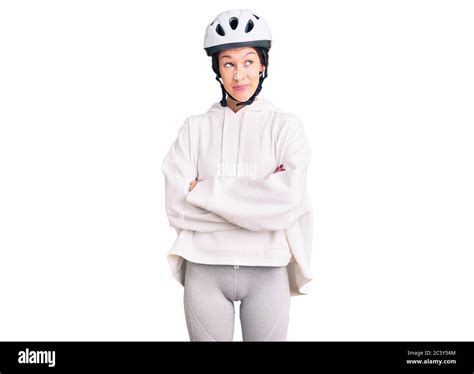 Beautiful Brunette Young Woman Wearing Bike Helmet And Sporty Clothes