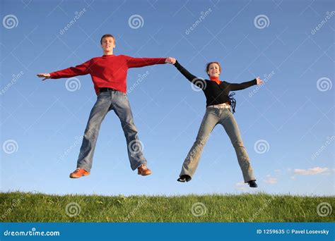 Jump couple stock image. Image of people, mental, jumping - 1259635