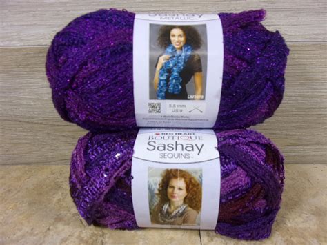 Lot Of 2 Skeins Red Heart Sashay Ruffle Scarf Yarn Amethyst Metallic