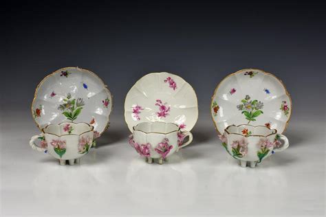 Lot A Pair Of Meissen Porcelain Floral Encrusted Cabinet Cups And